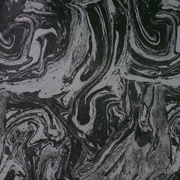 black & gray oil slick pattern fabric swatch
