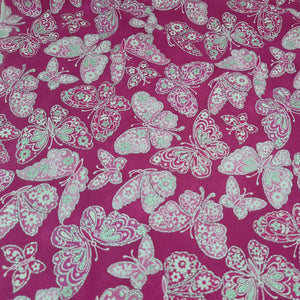 silver glitter butterflies on hot pink background fabric swatch