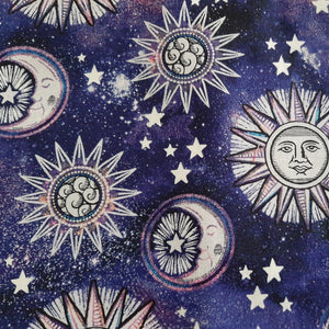 stars & moons with faces on purple cotton fabric